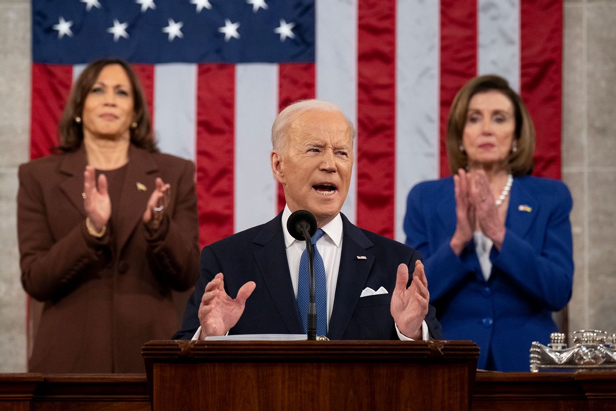 US President Joe Biden delivers the State of the Union address as U.S. Vice President Kamala Harris (L) and House Speaker Nancy Pelosi (D-CA) look on during a joint session of Congress in the U.S. Capitol House Chamber on March 1, 2022 in Washington, DC. (Saul Loeb - Pool/Getty Images)