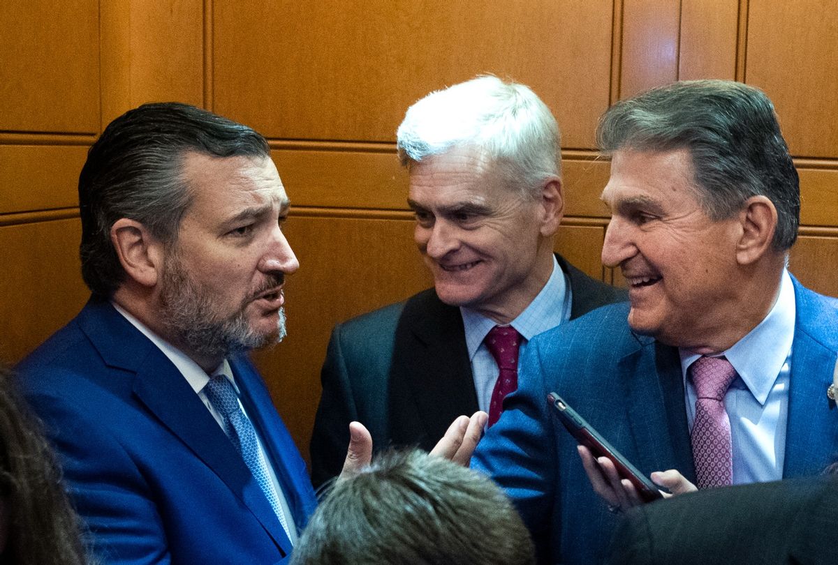 Sens. Joe Manchin, D-W.Va., center, and Ted Cruz, R-Texas, left, are seen during a Senate vote in the U.S. Capitol on Wednesday, September 22, 2021.  (Tom Williams/CQ-Roll Call, Inc via Getty Images)