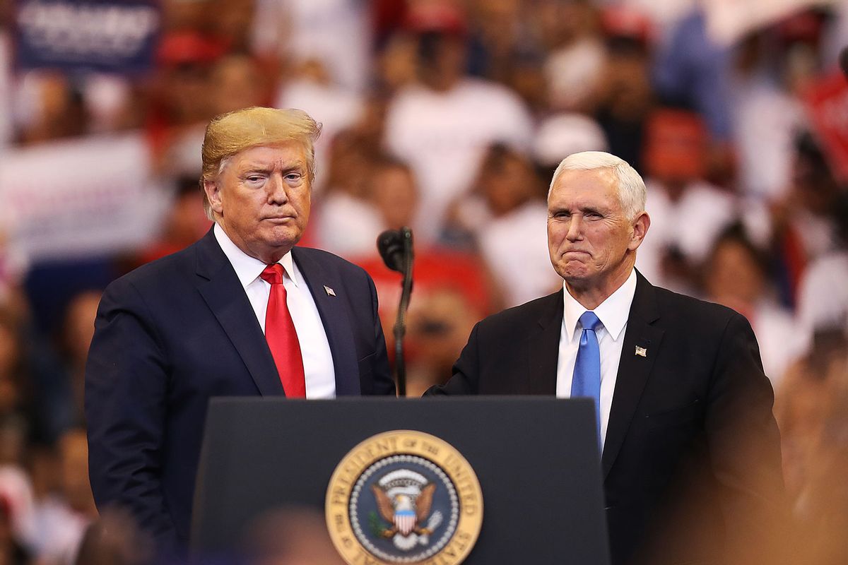 U.S. President Donald Trump and Vice President Mike Pence stand together during a homecoming campaign rally at the BB&T Center on November 26, 2019 in Sunrise, Florida. (Joe Raedle/Getty Images)