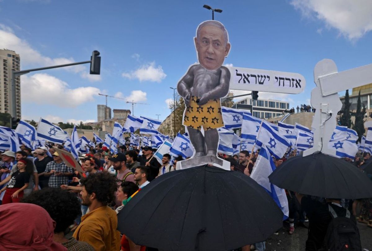 Protesters gather outside Israel's parliament in Jerusalem amid ongoing demonstrations and calls for a general strike against the hard-right government's controversial push to overhaul the justice system, on March 27, 2023.  (AHMAD GHARABLI/AFP via Getty Images)