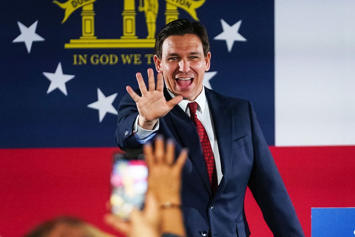 Florida Governor Ron DeSantis greets attendees as he arrives at an event on his nationwide book tour, at Adventure Outdoors, the largest gun store in the country, on March 30, 2023, in Smyrna, Georgia. (ELIJAH NOUVELAGE/AFP via Getty Images)
