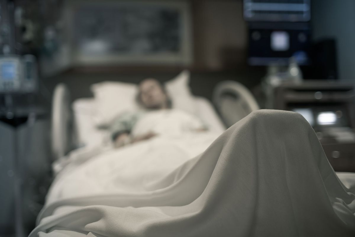 Woman in the hospital bed (Getty Images/kieferpix)