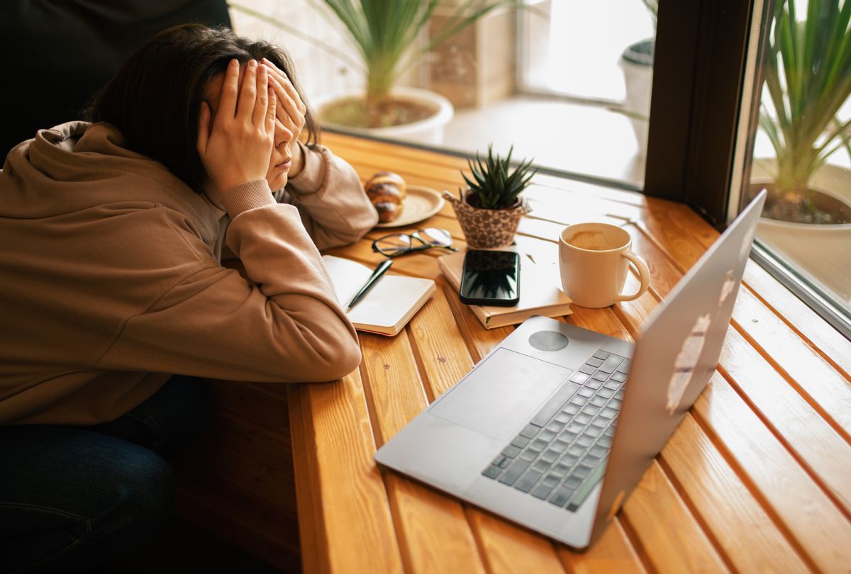 Overworked woman (Anastasiia Krivenok / Getty Images)