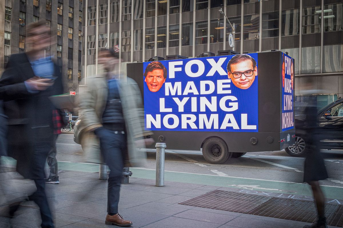 A billboard truck seen outside Fox News HQ. Members of the activist groups Truth Tuesdays and Rise and Resist gathered at the weekly FOX LIES DEMOCRACY DIES event outside the NewsCorp Building in Manhattan, this time with a billboard truck exposing Fox lies. (Erik McGregor/LightRocket via Getty Images)