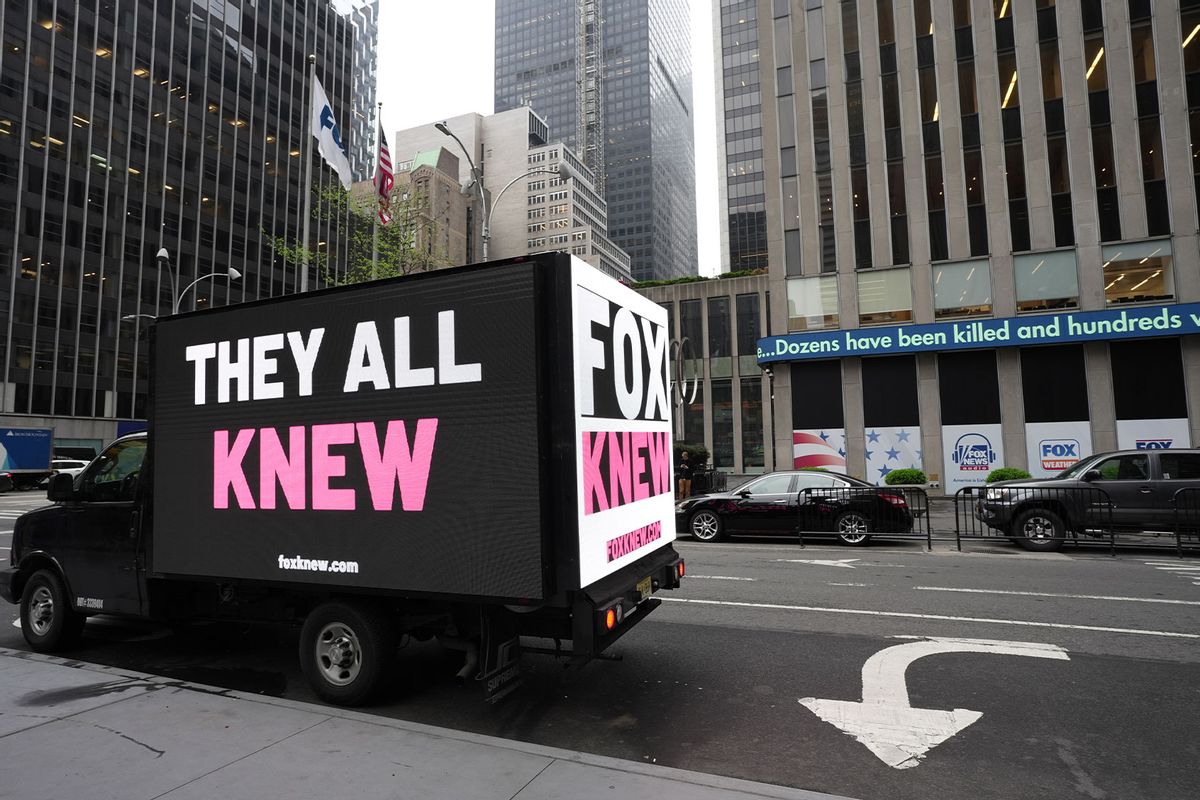A mobile billboard deployed by Media Matters circles Fox News Corp headquarters on April 17, 2023 in New York City. (Ilya S. Savenok/Getty Images for Media Matters)