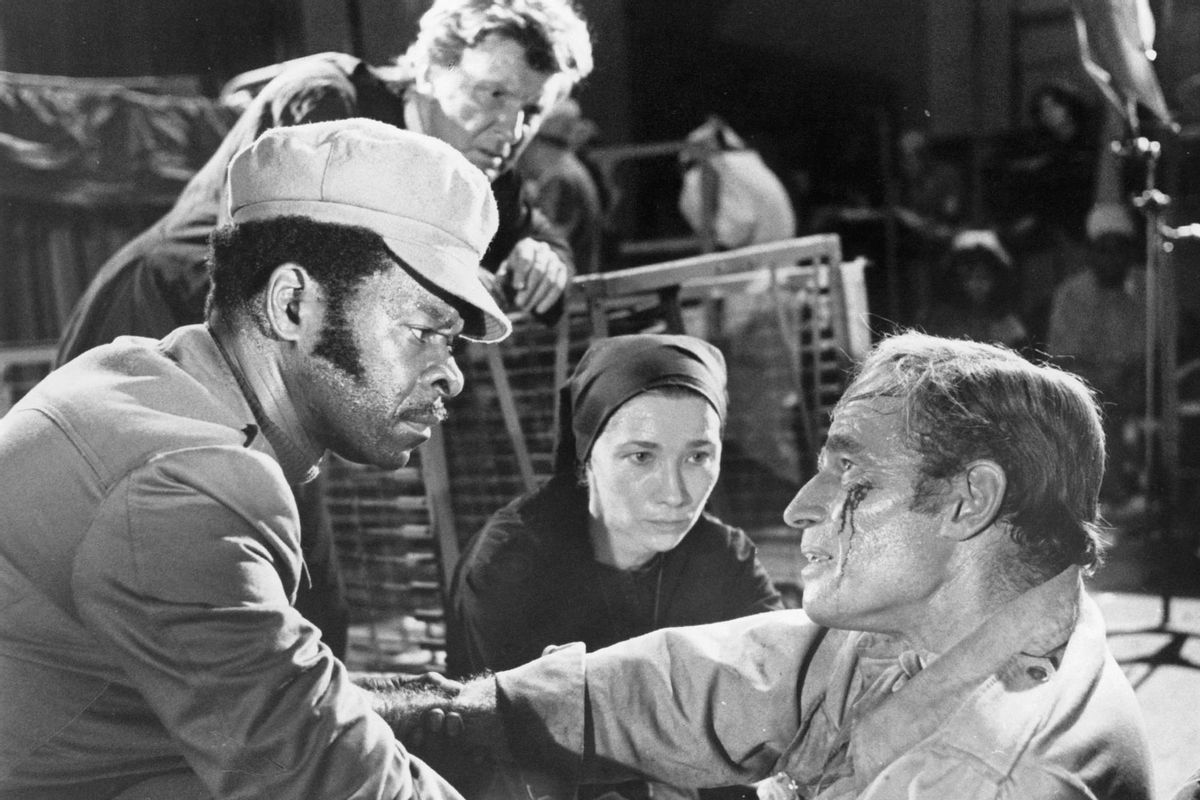 Brock Peters helps Charlton Heston in a scene from the film 'Soylent Green', 1973. (Metro-Goldwyn-Mayer/Getty Images)