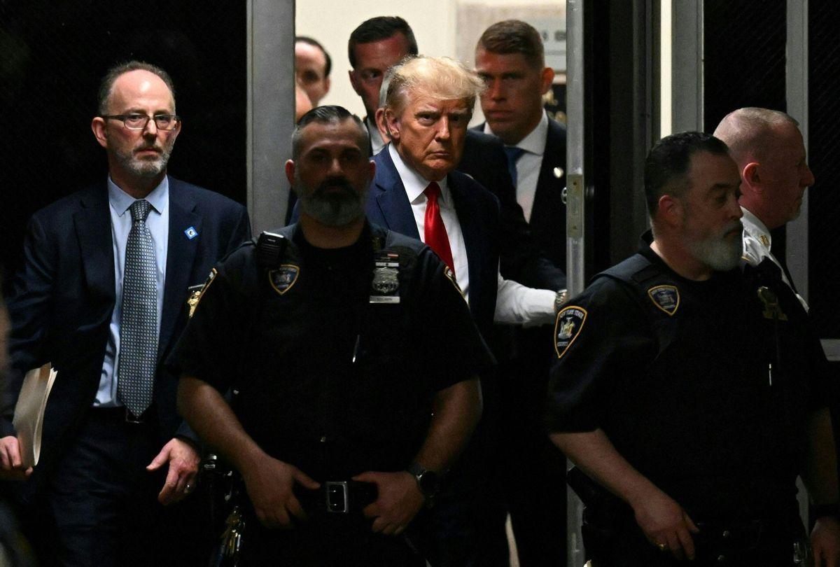 Former President Donald Trump makes his way inside the Manhattan Criminal Courthouse in New York on April 4, 2023.  (ED JONES/AFP via Getty Images)