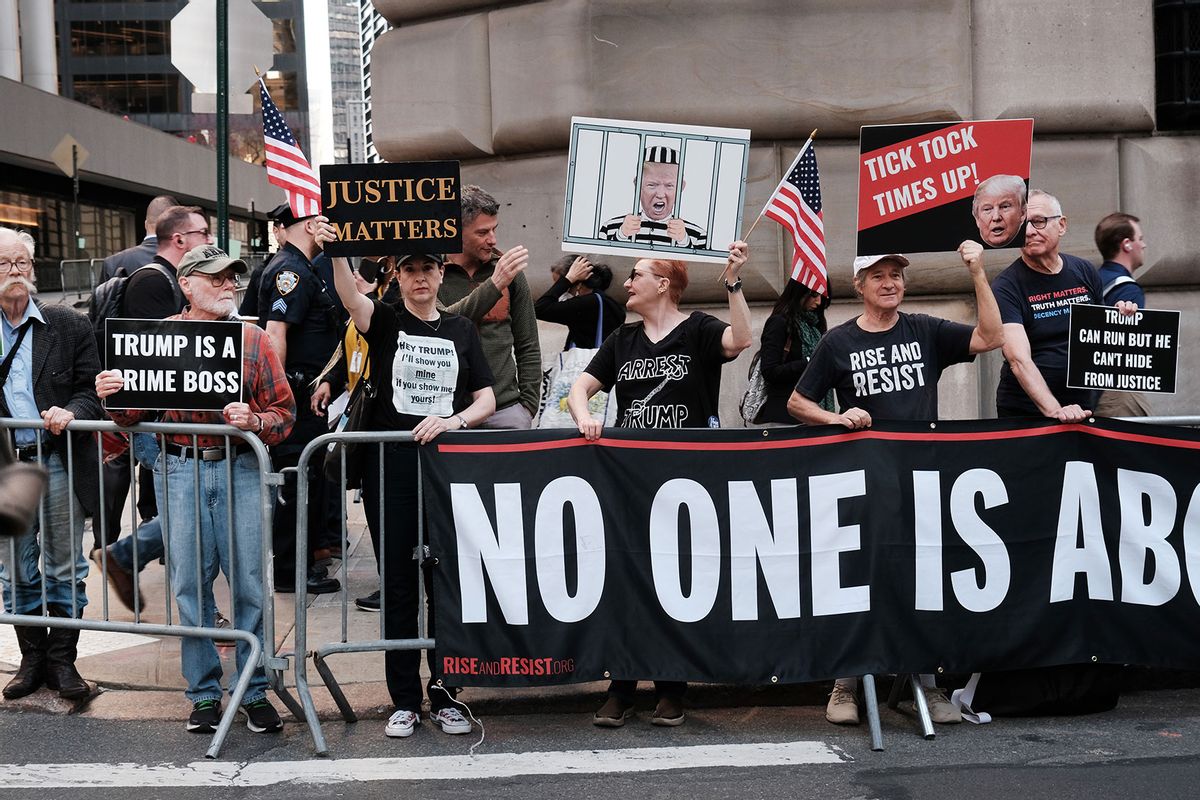 Police, media and protesters gather around the offices of New York’s Attorney General as former president Donald Trump is scheduled to arrive for his second deposition in a legal battle over his company's business practices on April 13, 2023 in New York City. (Spencer Platt/Getty Images)