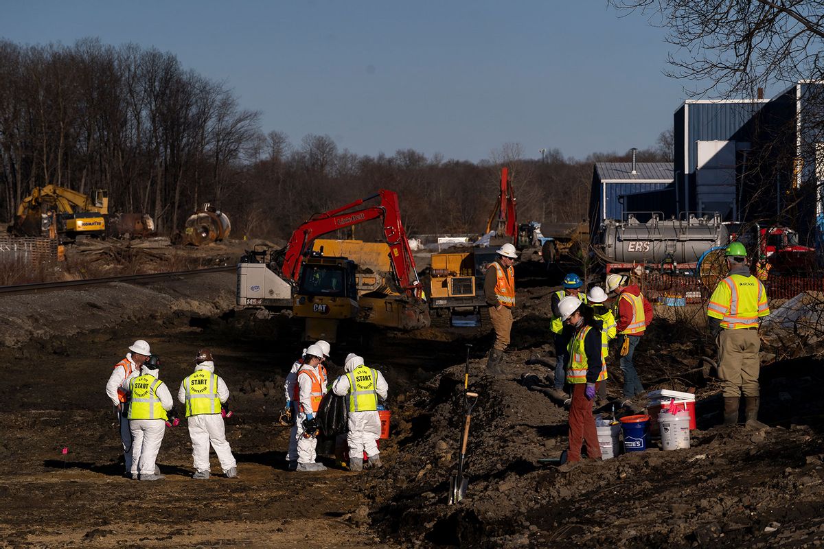 Ohio EPA and EPA contractors collect soil and air samples from the derailment site on March 9, 2023 in East Palestine, Ohio. Cleanup efforts continue after a Norfolk Southern train carrying toxic chemicals derailed causing an environmental disaster. (Michael Swensen/Getty Images)