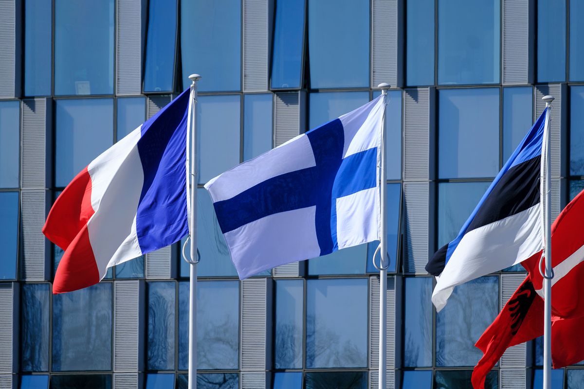 The Flag of Finland flies in front of the NATO Headquarters on April 4, 2023 in Brussels, Belgium. (Thierry Monasse/Getty Images)