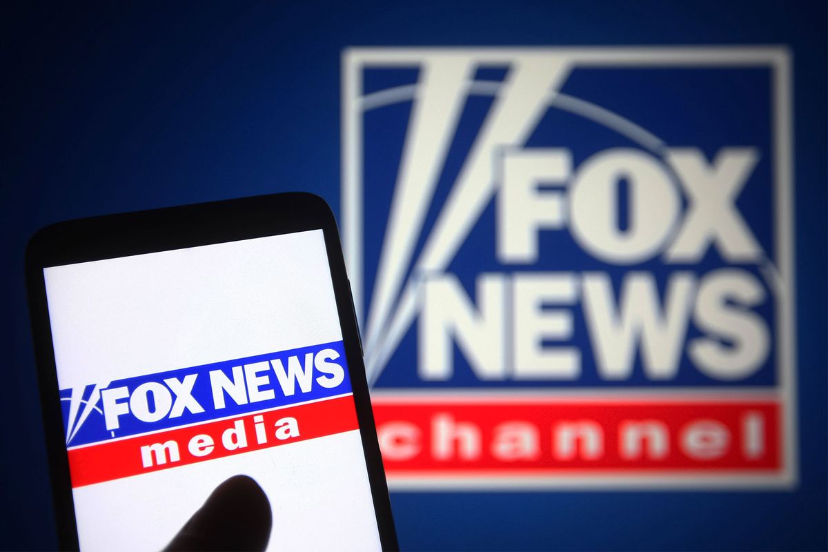 Fox News Channel (FNC) logo is seen on a smartphone and a pc screen. (Photo Illustration by Pavlo Gonchar/SOPA Images/LightRocket via Getty Images)