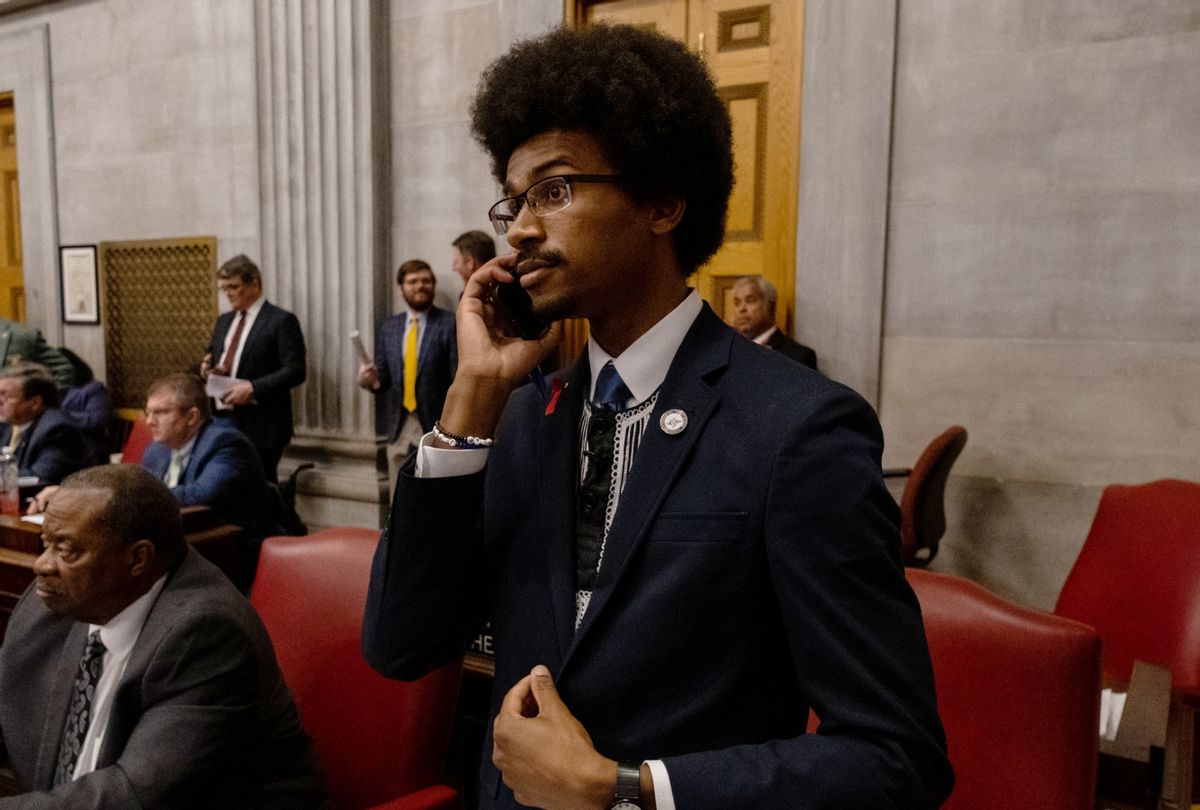 Democratic state Rep. Justin Pearson of Memphis speaks on his phone while being expelled from the state Legislature on April 6, 2023 in Nashville, Tennessee.  (Seth Herald/Getty Images)