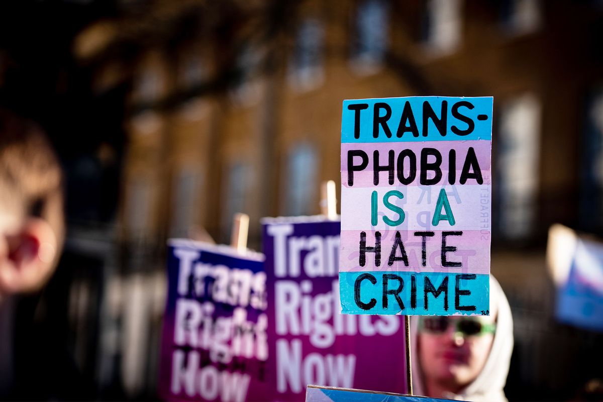 A protestor holds a placard during the Trans Rights Protest. (Loredana Sangiuliano/SOPA Images/LightRocket via Getty Images)