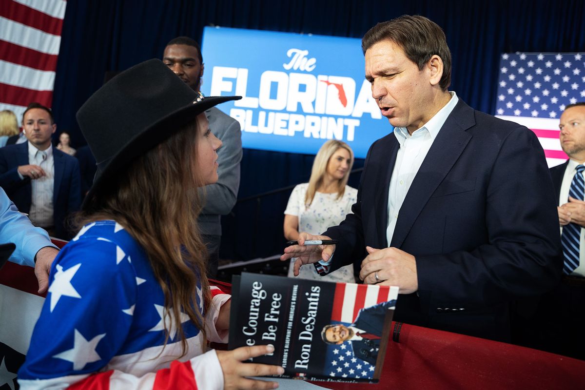Florida Governor Ron DeSantis reacts after signing a copy of his new book, "The Courage to Be Free: Florida's Blueprint for America's Revival," at the North Charleston Coliseum on April 19, 2023 in North Charleston, South Carolina. (Sean Rayford/Getty Images)