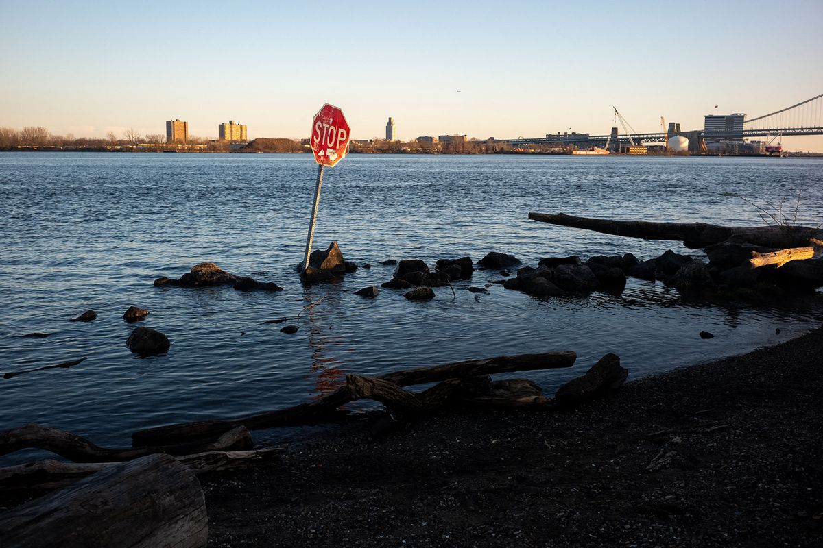 A stop sign in the Delaware River at Penn Treaty Park in Philadelphia, Pa., on March 26, 2023. Water in Philadelphia has been deemed unsafe to drink following a chemical spill in the Delaware River, leading to water bottles being sold out across the city. (Thomas Hengge/Anadolu Agency via Getty Images)