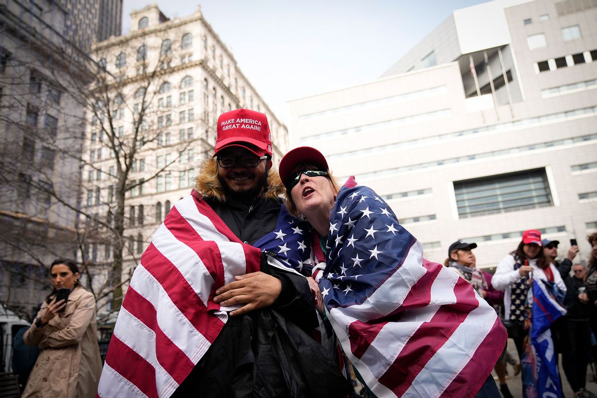 Supporters of former U.S. President Donald Trump gather outside the courthouse where former U.S. President Donald Trump will arrive later in the day for his arraignment on April 4, 2023 in New York City. (Drew Angerer/Getty Images)