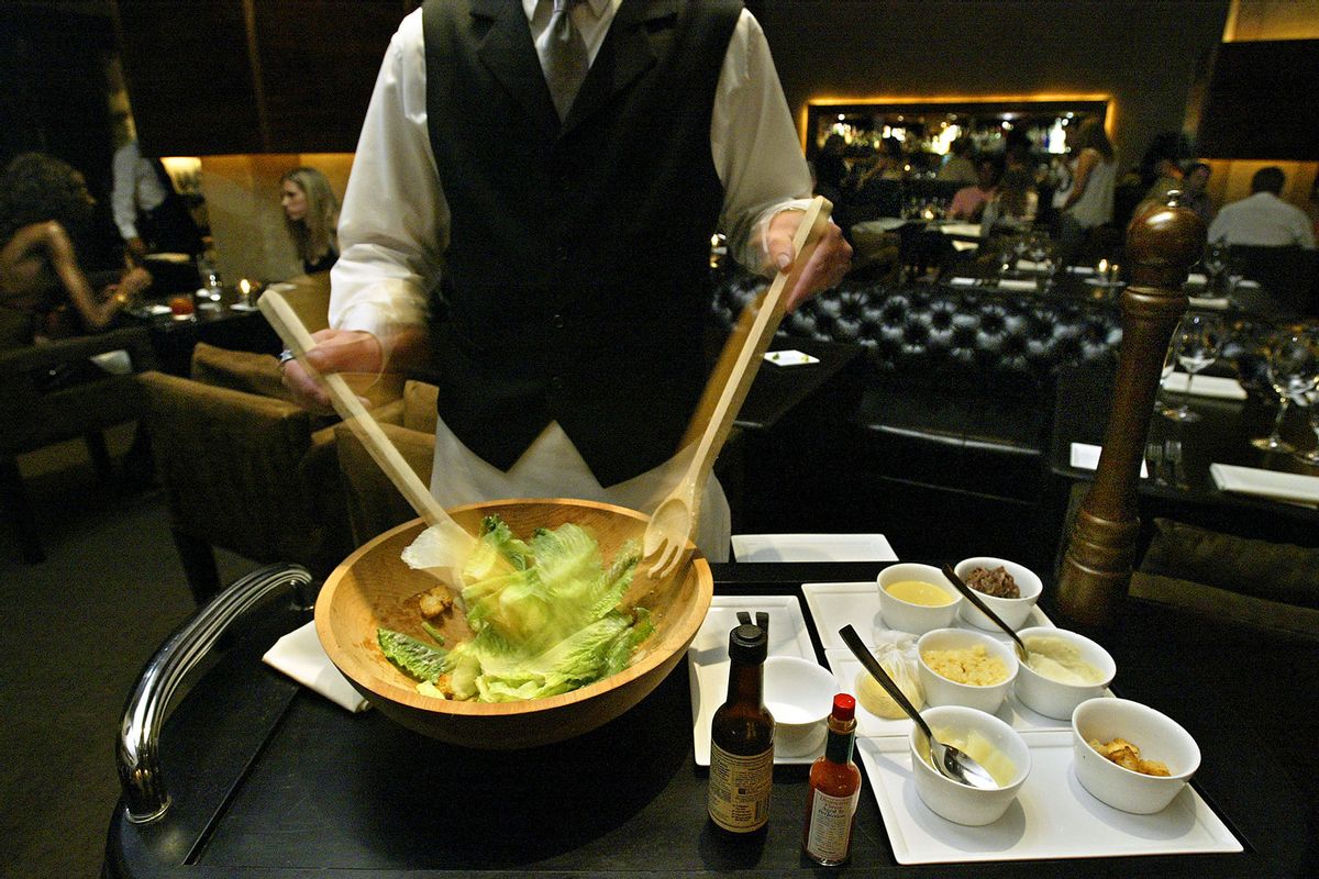 Caesar Salad prepared tableside at Dakota restaurant at the Hollywood Roosevelt Hotel. (Ricardo DeAratanha/Los Angeles Times via Getty Images)