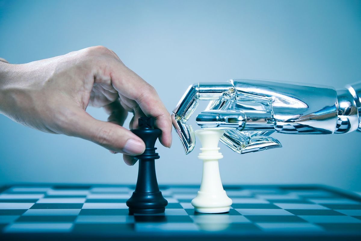 Robot playing chess with human (Getty Images/xijian)