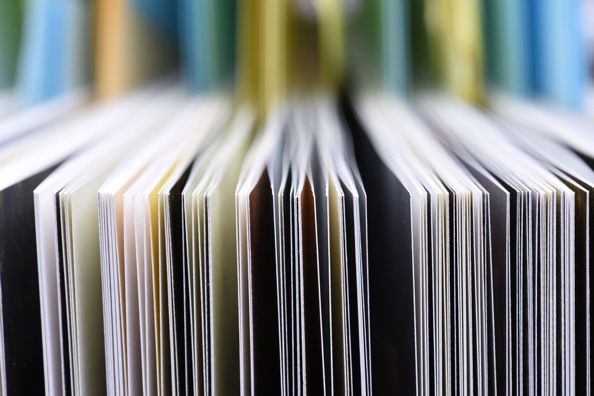 Closeup of the edge of open book pages (Getty Images/FactoryTh)