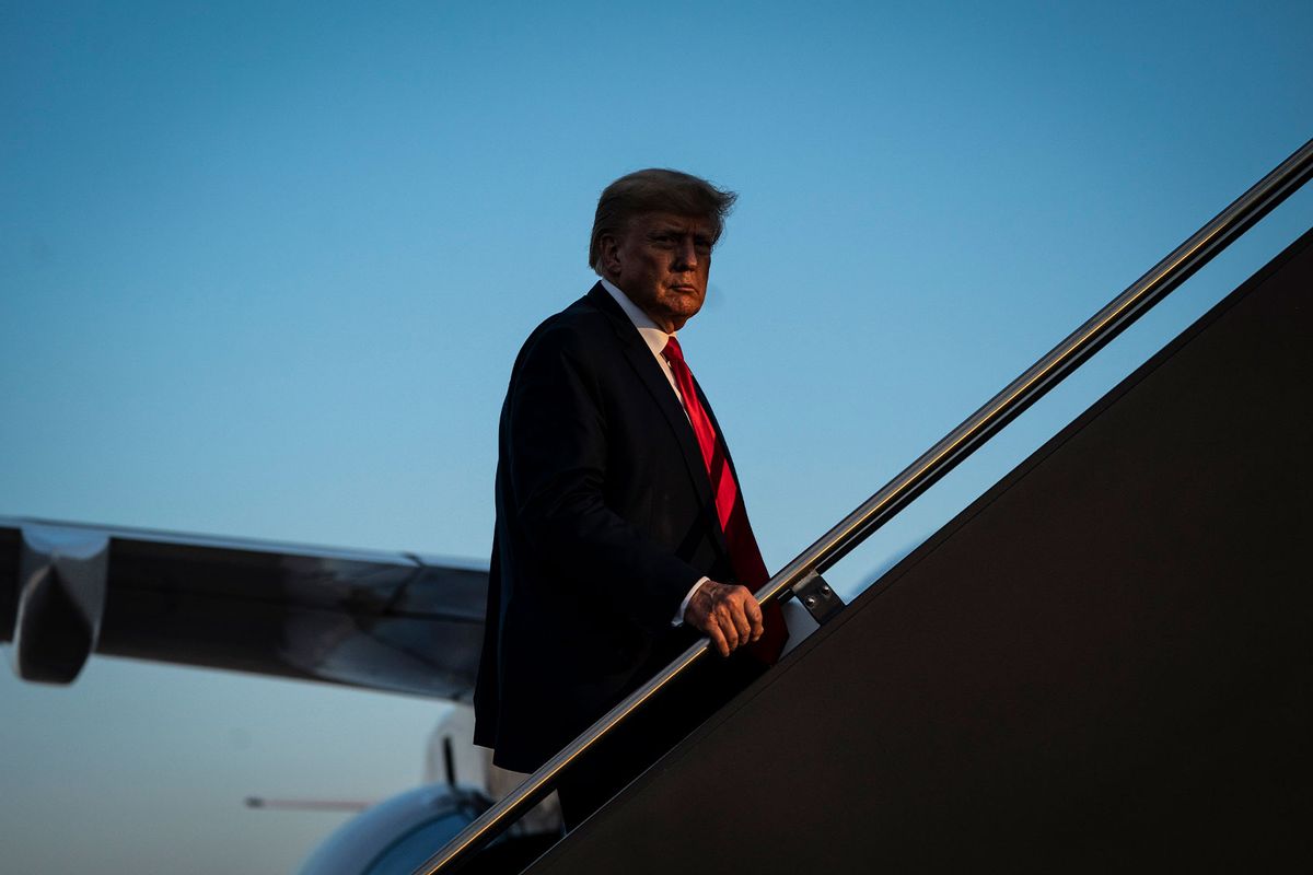Former President Donald Trump boards his airplane, known as "Trump Force One," after speaking at a campaign event, at the Manchester-Boston Regional Airport on Thursday, April 27, 2023, in Manchester, NH. (Jabin Botsford/The Washington Post via Getty Images)