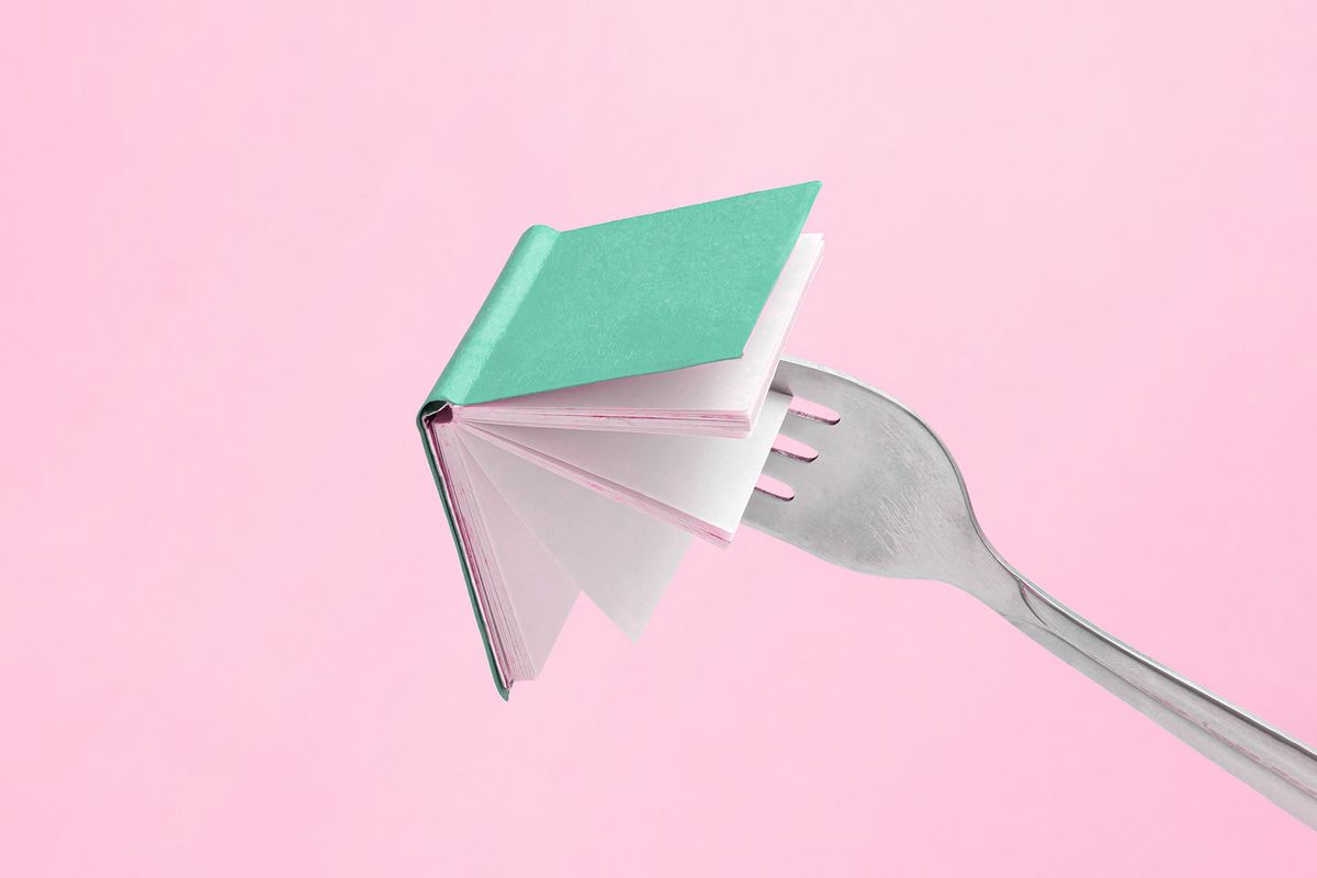 Fork stuck in a tiny book (Getty Images/jasmina buinac)