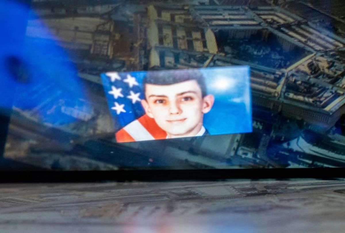 This photo illustration created on April 13, 2023, shows the Discord logo and the suspect, national guardsman Jack Teixeira, reflected in an image of the Pentagon in Washington, DC. - FBI agents on Thursday arrested a young national guardsman suspected of being behind a major leak of sensitive US government secrets -- including about the Ukraine war. US Attorney General Merrick Garland announced the arrest made "in connection with an investigation into alleged unauthorized removal, retention and transmission of classified national defense information."  (Photo by STEFANI REYNOLDS/AFP via Getty Images)