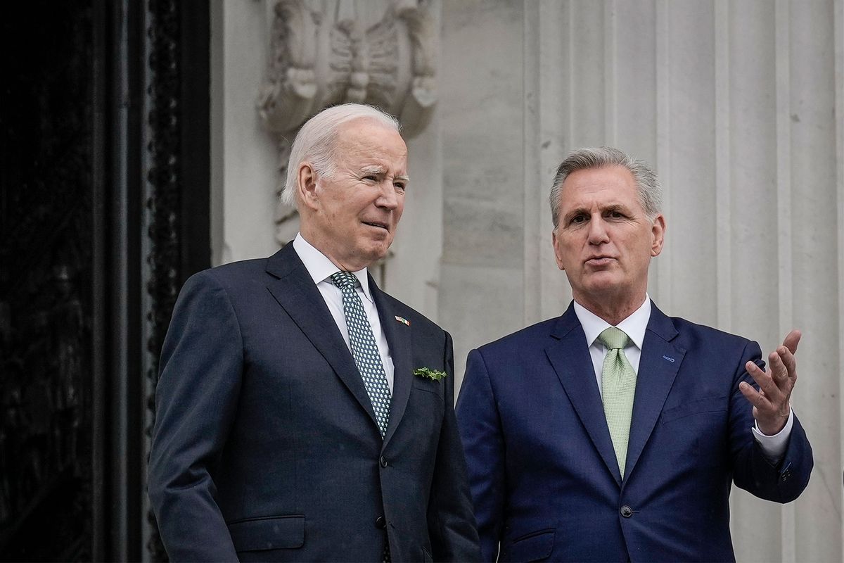 U.S. President Joe Biden and Speaker of the House Kevin McCarthy (R-CA) talk as they depart the U.S. Capitol on March 17, 2023 in Washington, DC. (Drew Angerer/Getty Images)