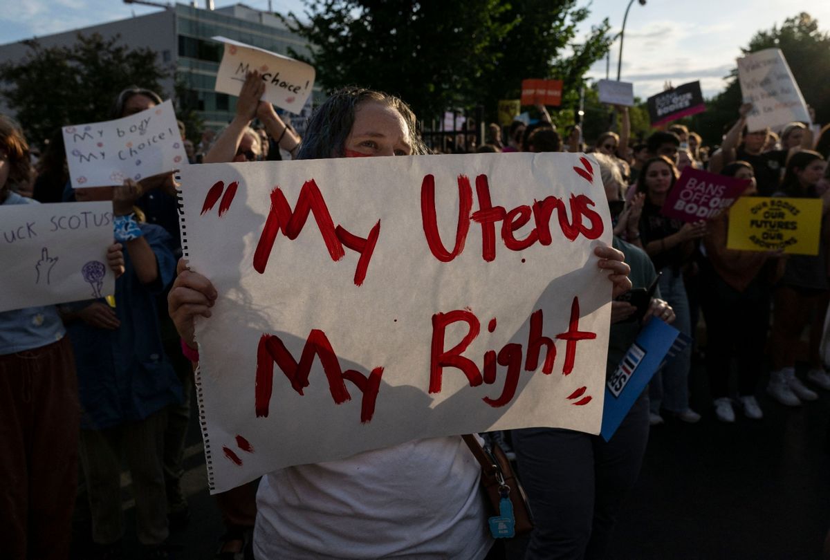 Pro-choice supporter holds a sign reading "My Uterus My Right" as activists protest outside the Planned Parenthood Reproductive Health Services Center after the overturning of Roe Vs. Wade by the US Supreme Court, in St. Louis, Missouri on June 24, 2022.  (ANGELA WEISS/AFP via Getty Images)