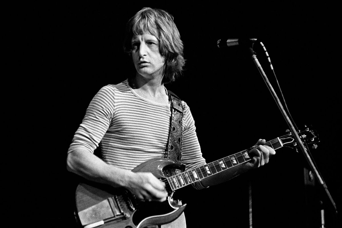 Photo of Badfinger and Pete Ham performing on stage (Photo by Fin Costello/Redferns/Getty Images)