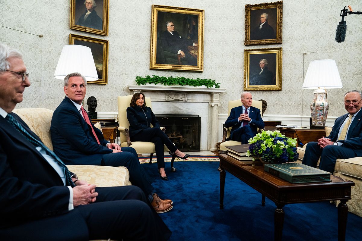 US President Joe Biden and Vice President Kamala Harris meet with House Speaker Kevin McCarthy, Minority Leader Mitch McConnell, and Senate Majority Leader Chuck Schumer in the Oval Office of the White House on Tuesday, May 16, 2023. (Demetrius Freeman/The Washington Post via Getty Images)