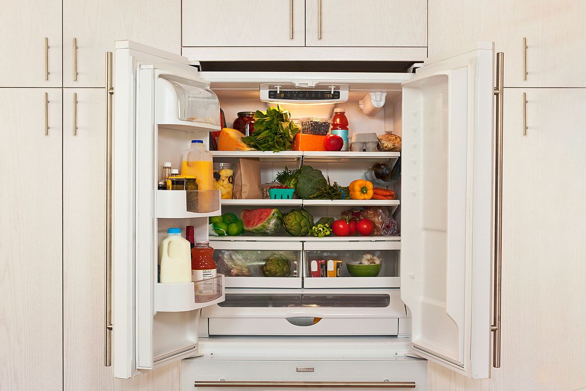 View of inside of refrigerator with healthy food (Getty Images/Karen Moskowitz)