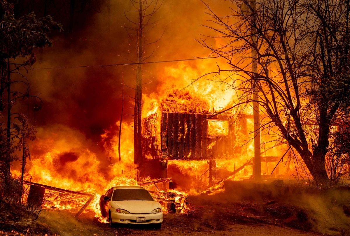 A home is engulfed in flames as the Dixie fire rages on in Greenville, California on August 5, 2021.  (JOSH EDELSON/AFP via Getty Images)