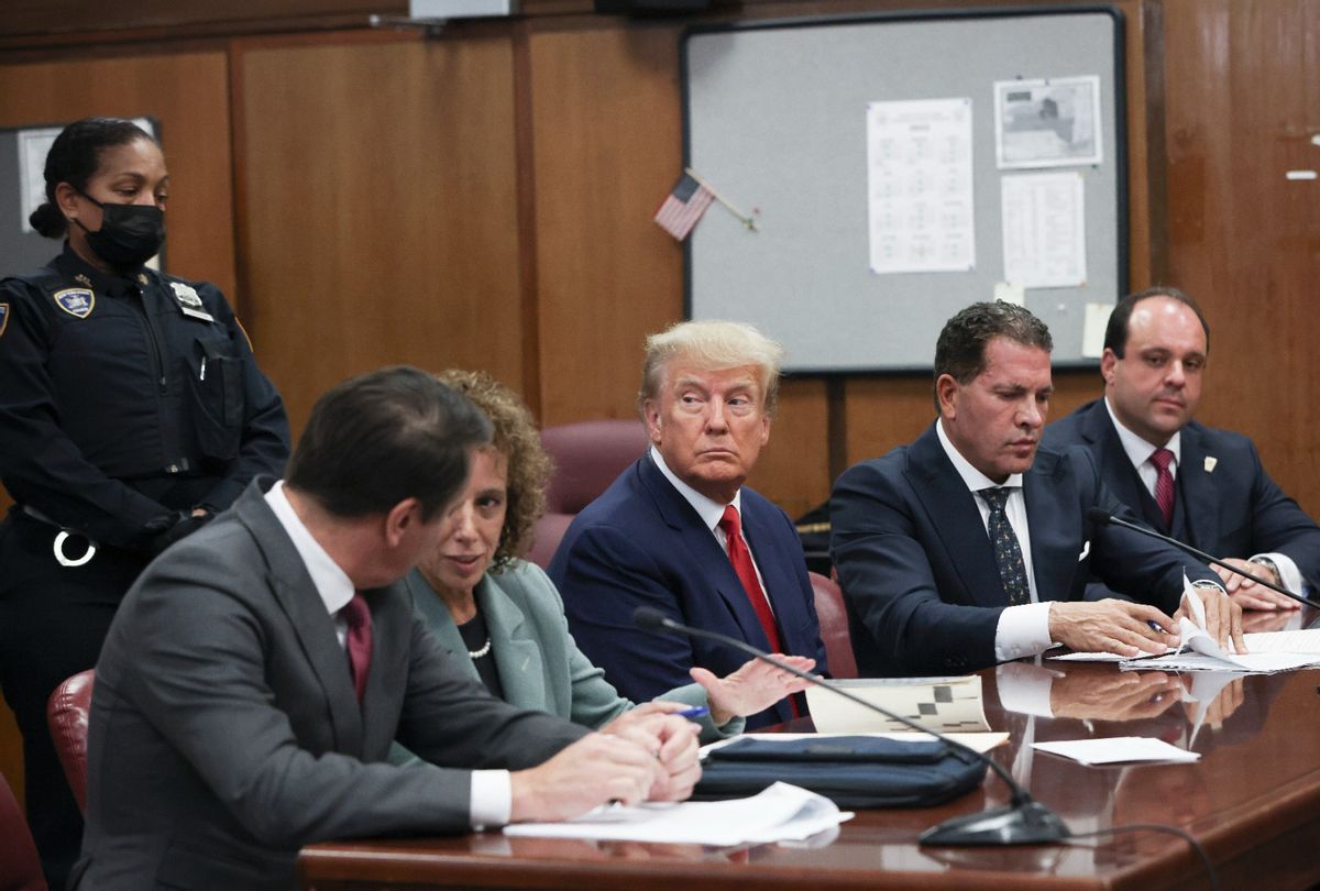 Former President Donald Trump sits in the courtroom with his attorneys (L-R) Todd Blanche, Susan Necheles, Joe Tacopina and Boris Epshteyn during his arraignment at the Manhattan Criminal Court April 4, 2023 in New York City.  (Andrew Kelly-Pool/Getty Images)