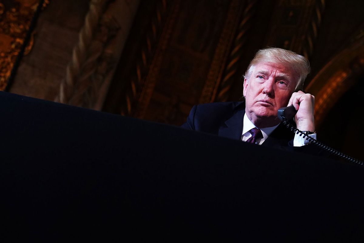 US President Donald Trump speaks to members of the military via teleconference from his Mar-a-Lago resort in Palm Beach, Florida, on Thanksgiving Day, November 22, 2018. (MANDEL NGAN/AFP via Getty Images)