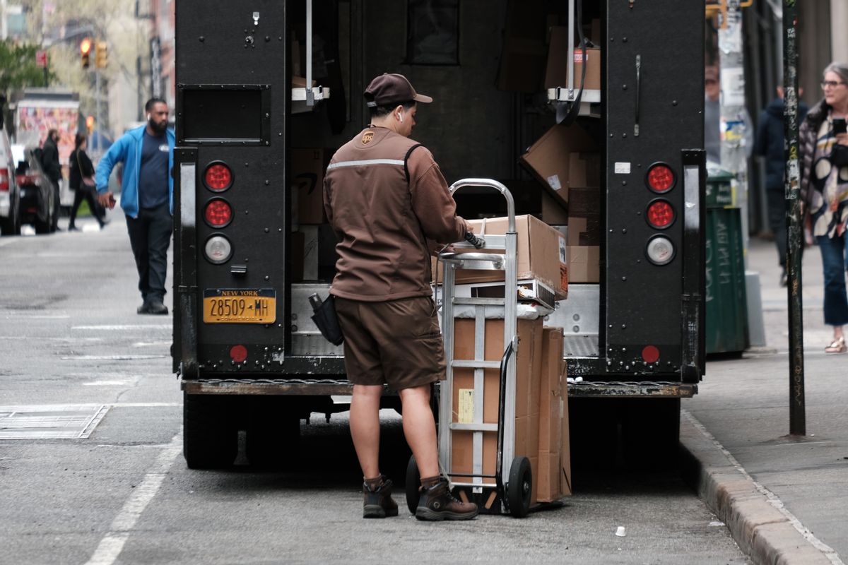 A UPS worker delivers boxes in Manhattan.  (Spencer Platt/Getty Images)