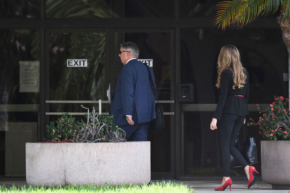 Jim Trusty (L) and Lindsey Halligan (R), part of former US President Donald Trumps legal team, arrive at the Paul G. Rogers Federal Building and Courthouse in West Palm Beach, Florida, on September 1, 2022. (MARCO BELLO/AFP via Getty Images)