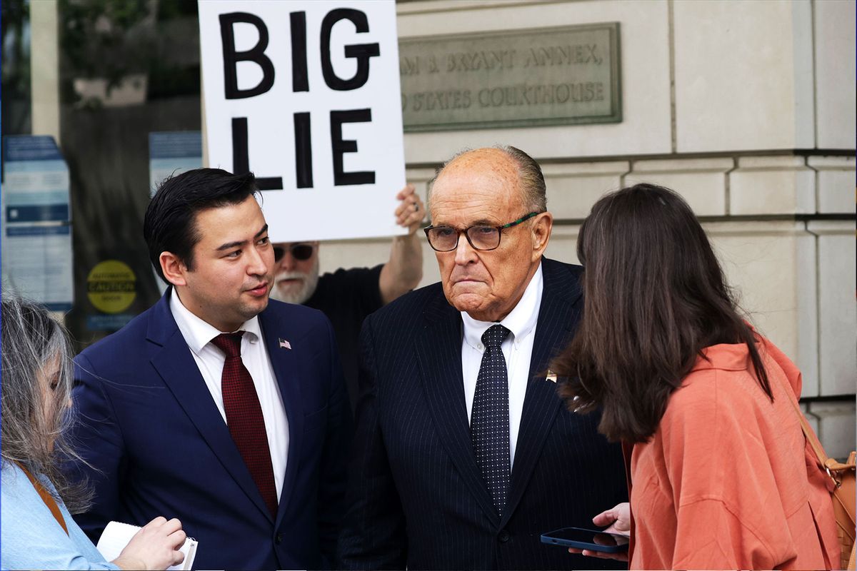 Former New York City Mayor and former personal lawyer for former President Donald Trump Rudy Giuliani talks to members of the press before he leaves the U.S. District Court on May 19, 2023 in Washington, DC.  (Alex Wong/Getty Images)