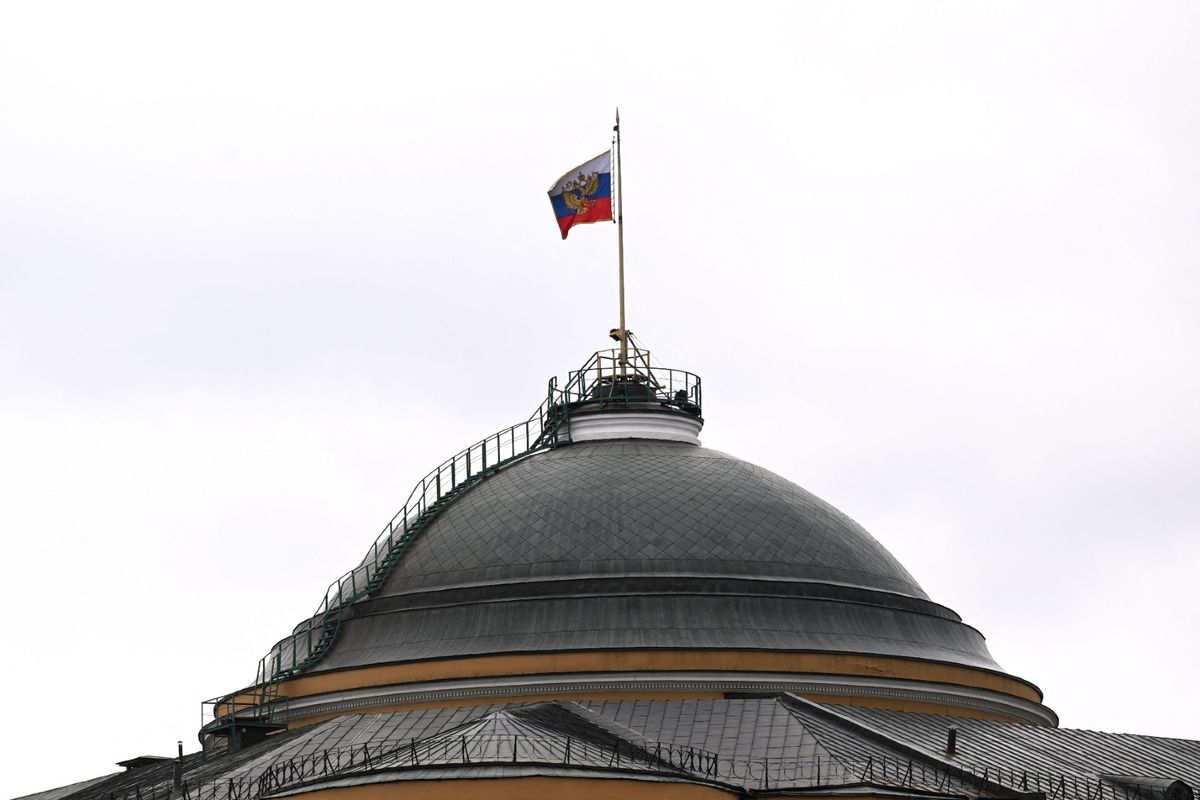 The national flag of Russia flutters above the residence of the Russian president, at the Kremlin in Moscow on June 24, 2023. (NATALIA KOLESNIKOVA/AFP via Getty Images)