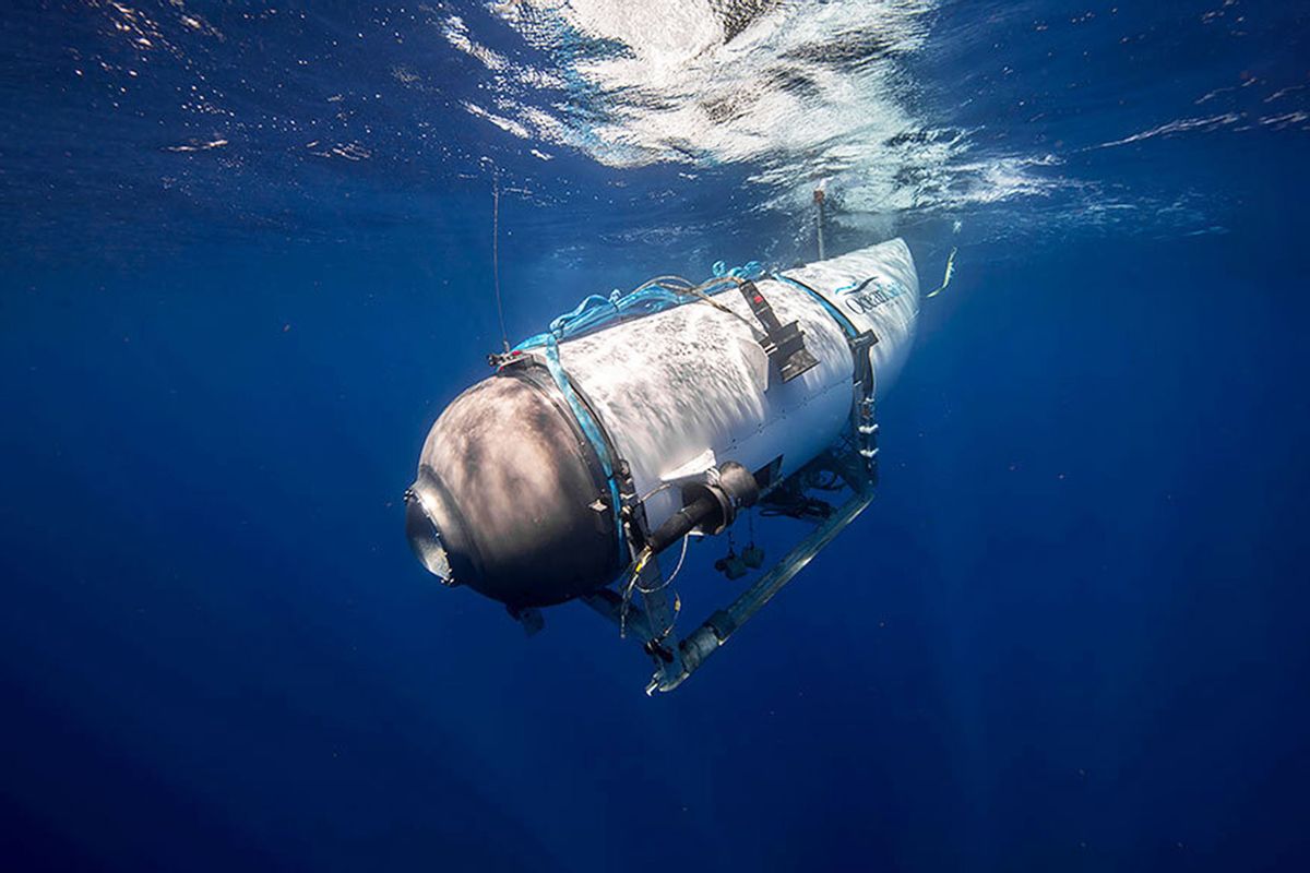 An undated photo shows tourist submersible belongs to OceanGate begins to descent at a sea. Search and rescue operations continue by US Coast Guard in Boston after a tourist submarine bound for the Titanic's wreckage site went missing off the southeastern coast of Canada. (Ocean Gate / Handout/Anadolu Agency via Getty Images)