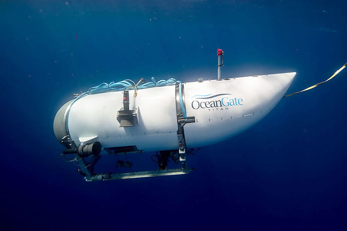 An undated photo shows tourist submersible belongs to OceanGate begins to descent at a sea. Search and rescue operations continue by US Coast Guard in Boston after a tourist submarine bound for the Titanic's wreckage site went missing off the southeastern coast of Canada. (Ocean Gate / Handout/Anadolu Agency via Getty Images)