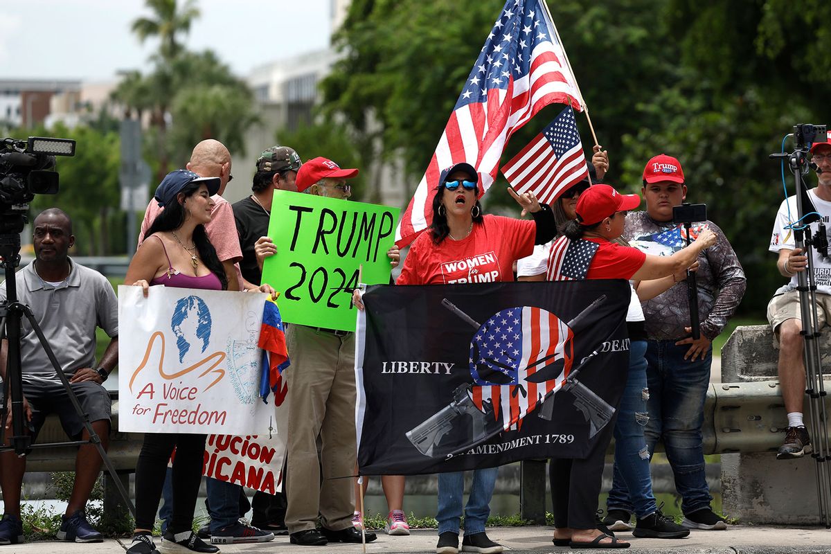 Supporters of former U.S. President Donald Trump protest outside of Trump National Doral resort as they await his arrival on June 12, 2023 in Doral, Florida. (Anna Moneymaker/Getty Images)