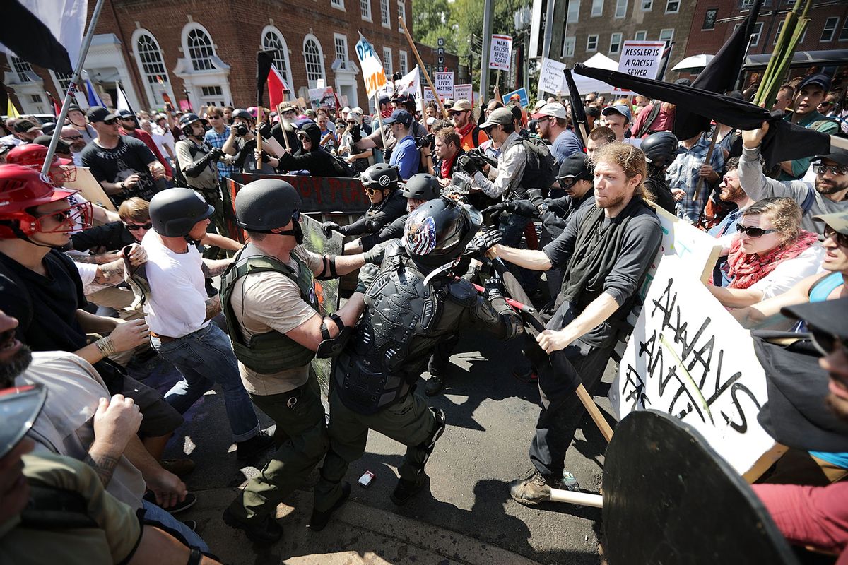 White nationalists, neo-Nazis and members of the "alt-right" clash with counter-protesters as they enter Emancipation Park during the "Unite the Right" rally August 12, 2017 in Charlottesville, Virginia. (Chip Somodevilla/Getty Images)