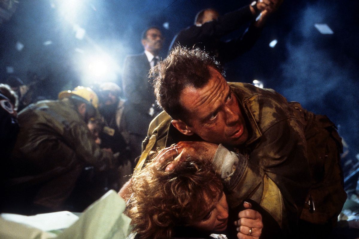 Bonnie Bedelia is held down by Bruce Willis in a scene from the film 'Die Hard', 1988. (Photo by 20th Century-Fox/Getty Images)