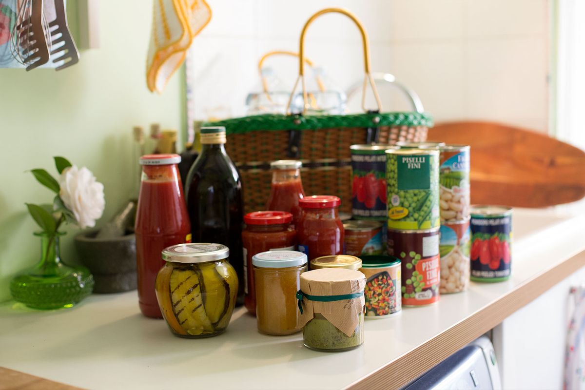 Unpacked groceries on kitchen counter, canned and preserved foods (Getty Images/Kathrin Ziegler)