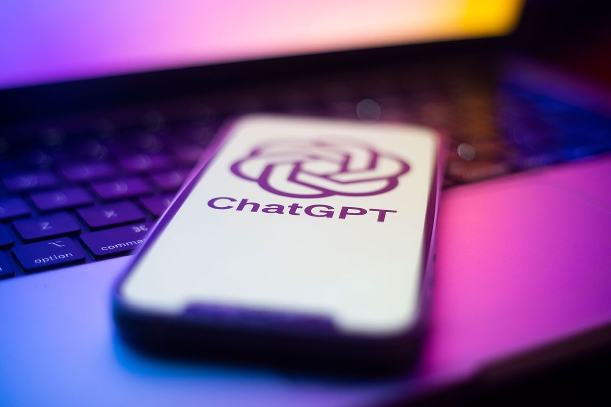 The OpenAI ChatGPT logo is seen on a mobile phone (Jaap Arriens/NurPhoto via Getty Images)