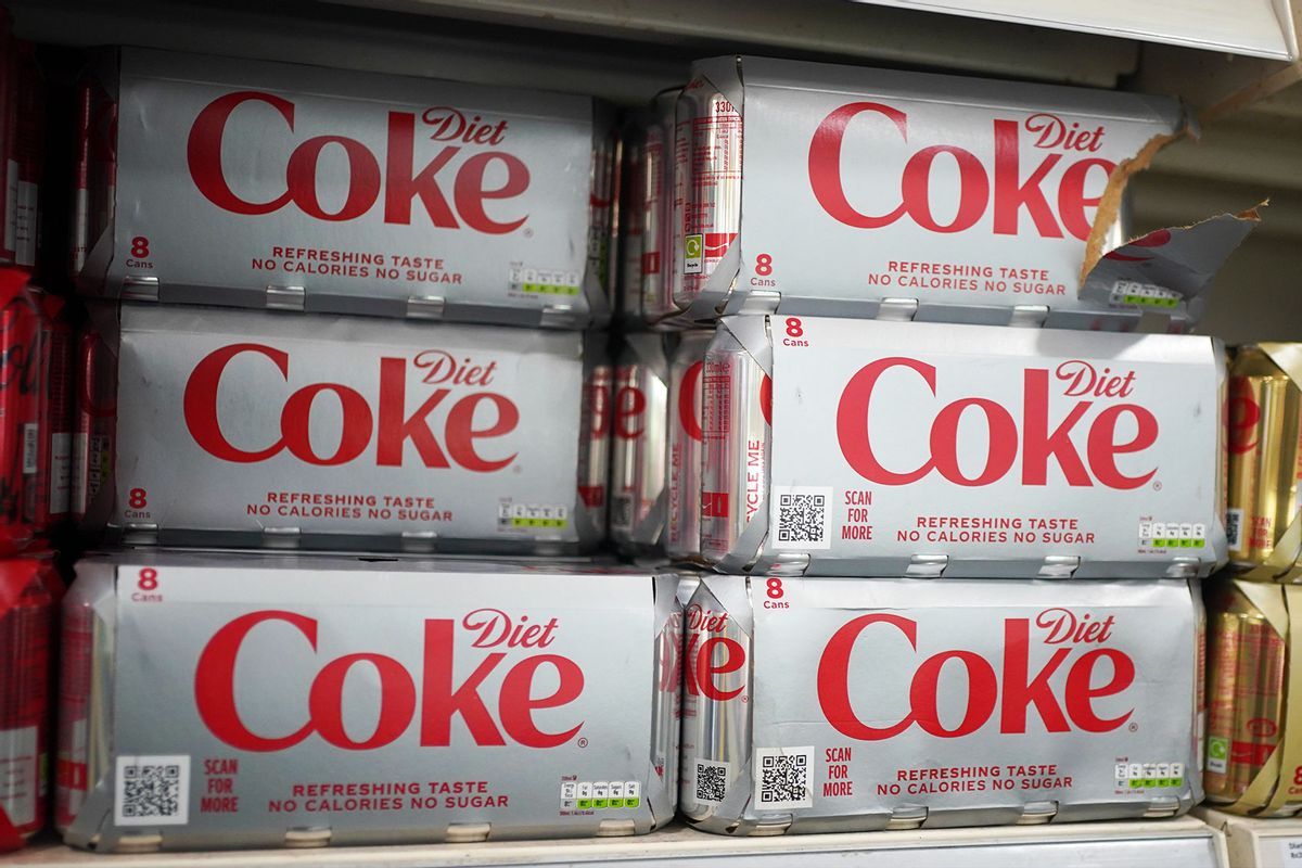 Cans of Diet Coke in a supermarket, as an artificial sweetener commonly used in thousands of products including diet fizzy drinks, ice cream and chewing gum is to be listed as posing a possible cancer risk to humans, according to reports. (Yui Mok/PA Images via Getty Images)
