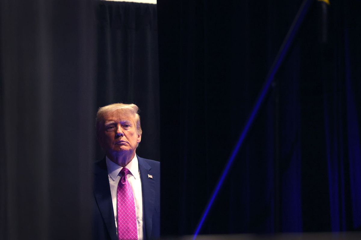Former U.S. President Donald Trump waits to be introduced at the Oakland County Republican Party's Lincoln Day dinner at Suburban Collection Showplace on June 25, 2023 in Novi, Michigan. (Scott Olson/Getty Images)
