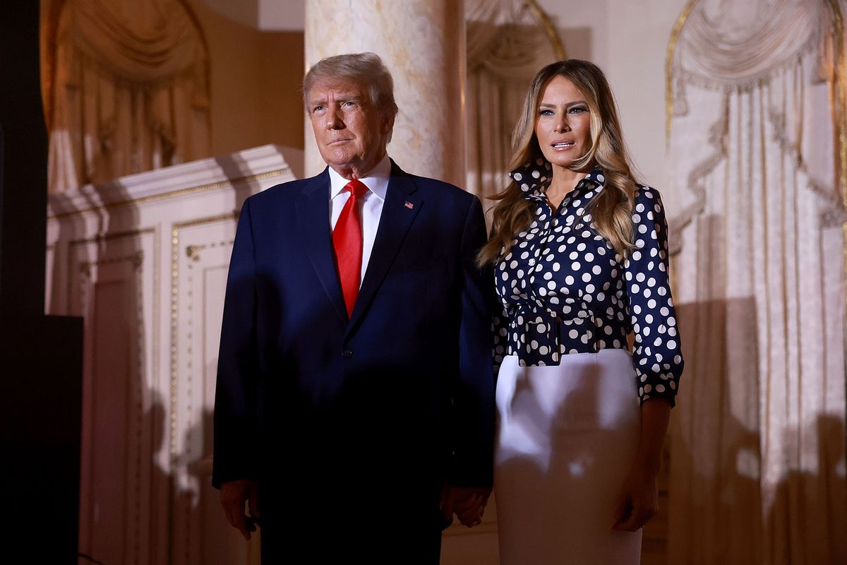 Former U.S. President Donald Trump and former First Lady Melania Trump arrive for an event at his Mar-a-Lago home on November 15, 2022 in Palm Beach, Florida. (Joe Raedle/Getty Images)