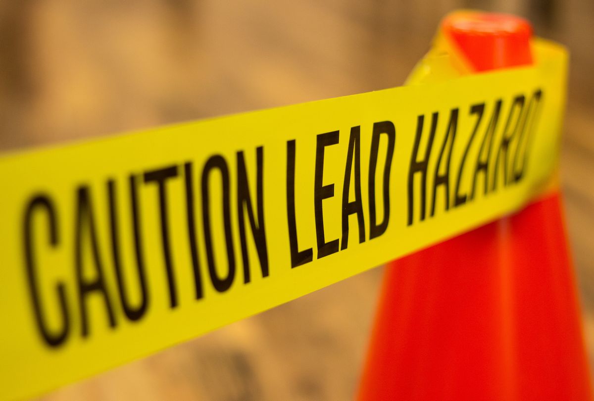Caution tape describing lead-based paint hazard. (DarrenTownsend via Getty Images) (DarrenTownsend via Getty Images)