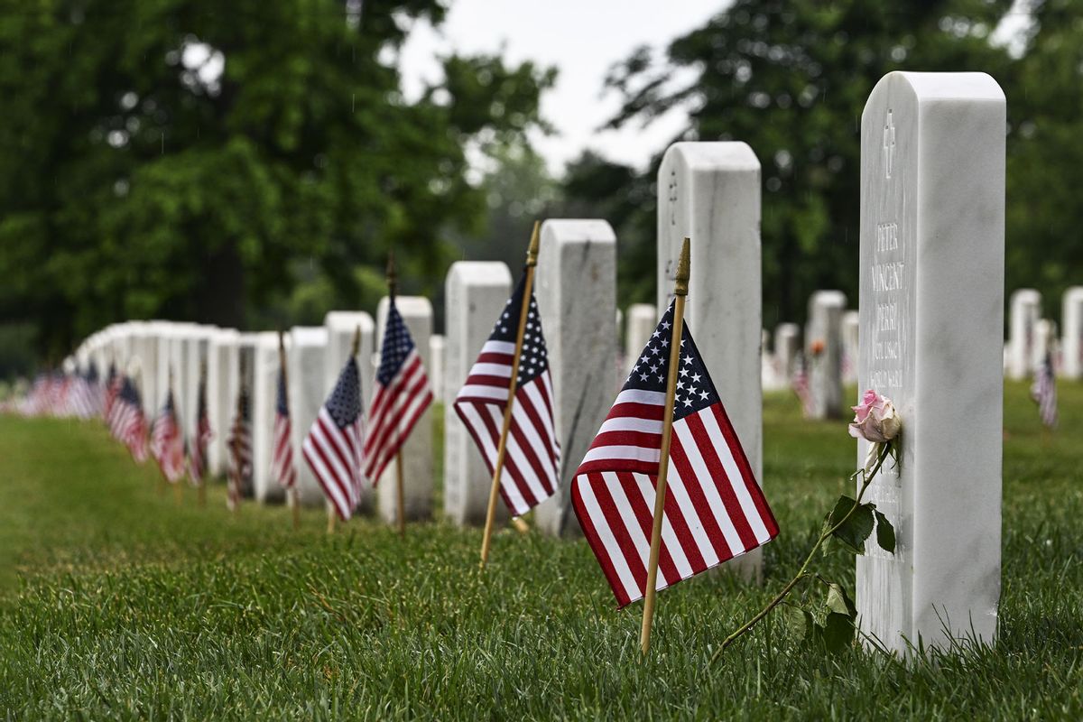 Headstones and American flags are seen at the Arlington National Cemetery, United States military cemetery in Virginia, United States on May 29, 2023. (Celal Gunes/Anadolu Agency via Getty Images)